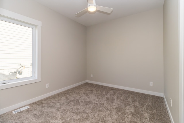 unfurnished room with carpet floors