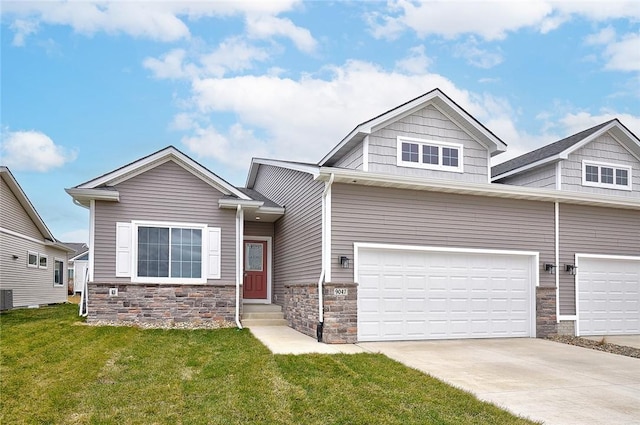 craftsman inspired home featuring a garage, a front yard, and central AC