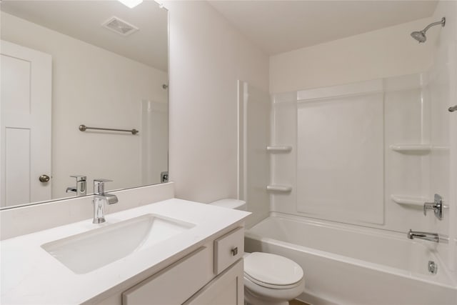 full bathroom with vanity, washtub / shower combination, and toilet