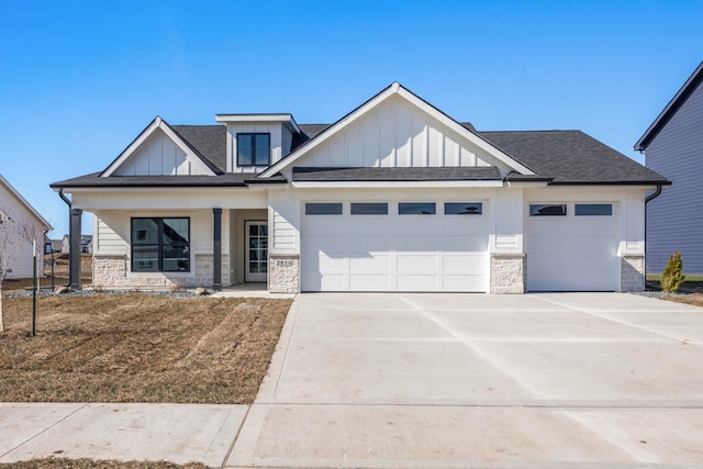 craftsman house featuring a porch and a garage