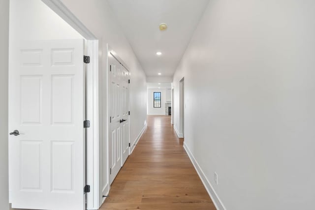 2814 NW Westwood Ct, Ankeny, IA 50023 - hallway featuring light hardwood / wood-style flooring