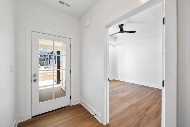 2814 NW Westwood Ct, Ankeny, IA 50023 - doorway to outside featuring ceiling fan and light wood-type flooring