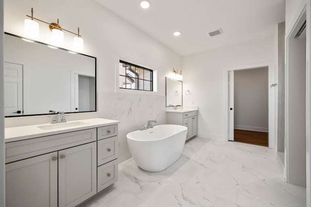 2814 NW Westwood Ct, Ankeny, IA 50023 - bathroom with tile floors, oversized vanity, and a bathtub