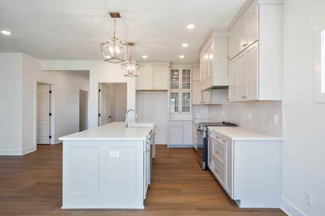 2814 NW Westwood Ct, Ankeny, IA 50023 - kitchen with electric stove, white cabinetry, and dark hardwood / wood-style floors