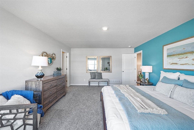 carpeted bedroom with a textured ceiling