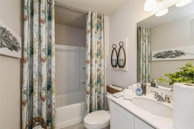 full bathroom featuring vanity, shower / bath combo with shower curtain, and toilet