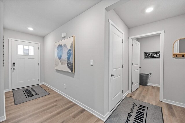 entrance foyer featuring light hardwood / wood-style floors