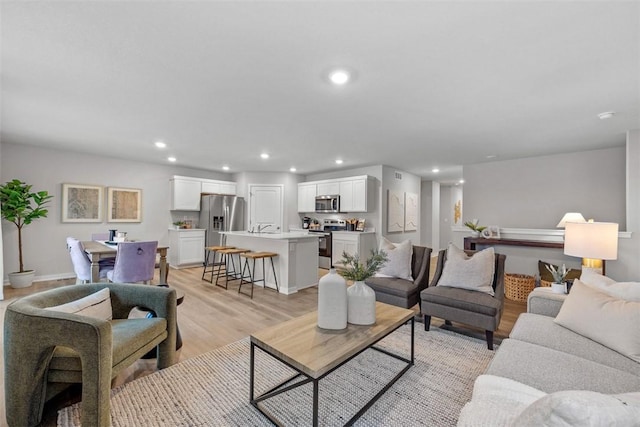 living room featuring light hardwood / wood-style floors