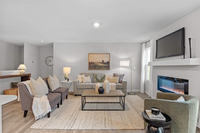 living room with light hardwood / wood-style floors