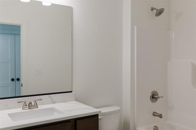 full bathroom featuring vanity, toilet, and shower / tub combination