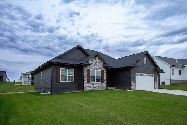 view of front of house featuring a garage and a front yard