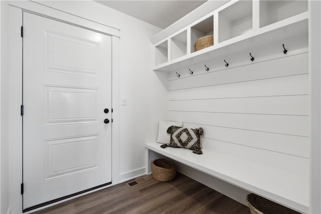 mudroom with dark hardwood / wood-style flooring