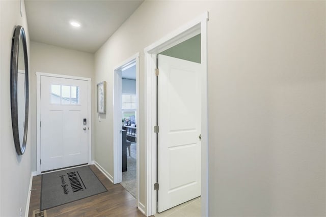 doorway to outside with hardwood / wood-style floors