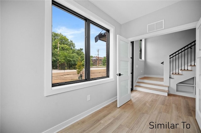 interior space featuring a healthy amount of sunlight and light wood-type flooring