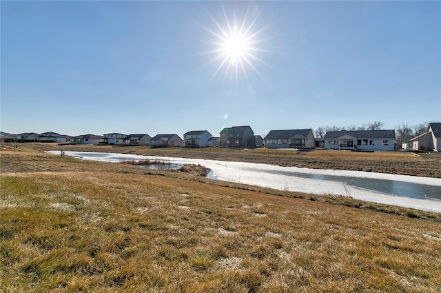 view of yard with a water view