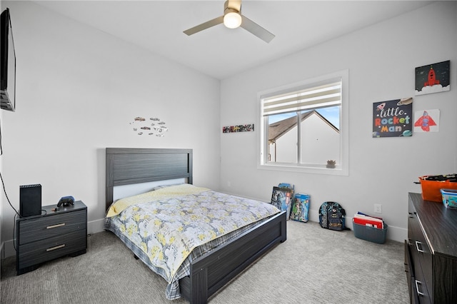 carpeted bedroom with ceiling fan