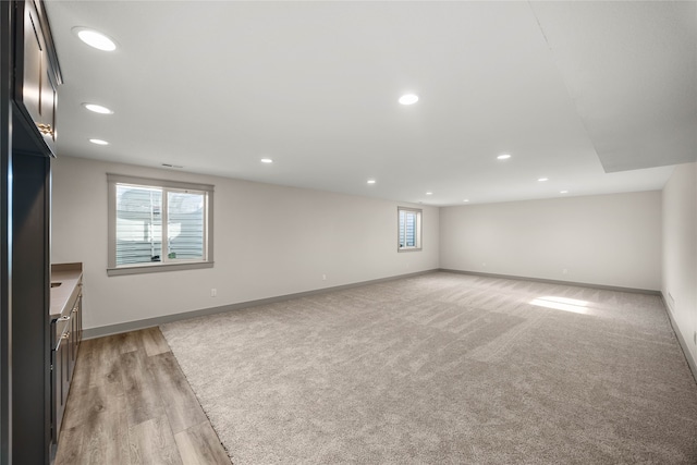 basement with light wood-type flooring