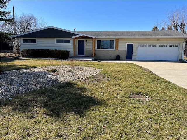 single story home featuring a front lawn and a garage