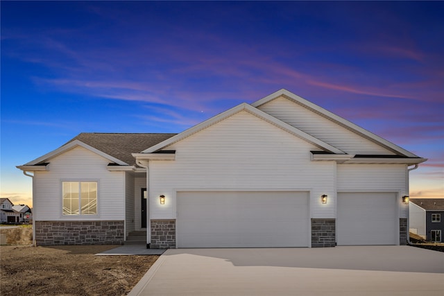 view of front of home featuring a garage