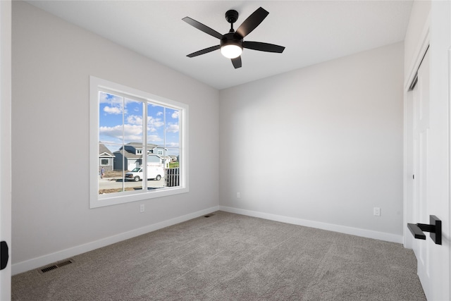 unfurnished bedroom featuring carpet flooring and ceiling fan