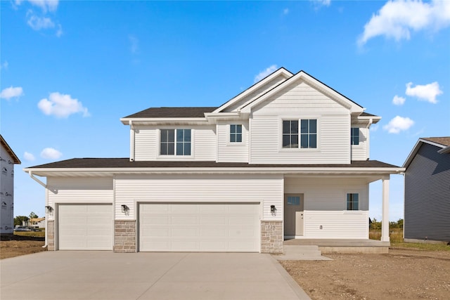 view of front of home with a garage