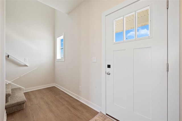 entryway with light hardwood / wood-style floors