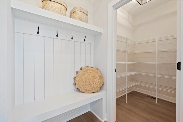 mudroom with wood-type flooring