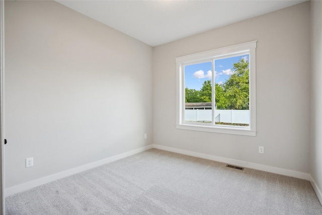 view of carpeted spare room