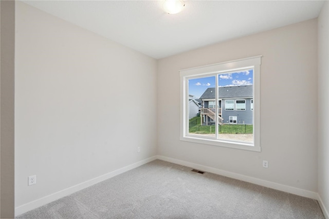 view of carpeted spare room