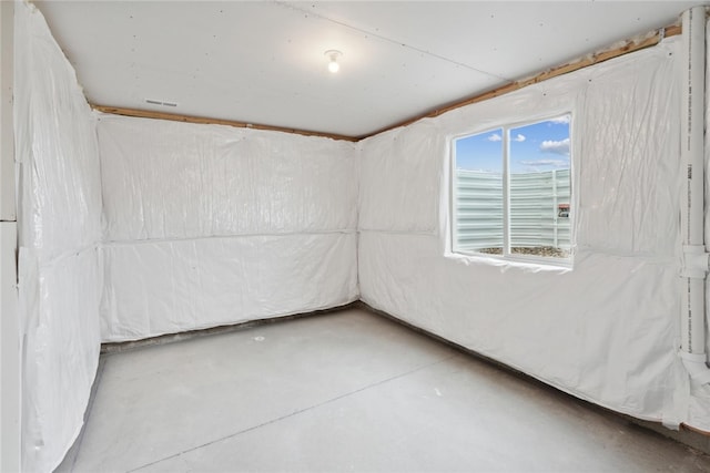 empty room featuring concrete floors