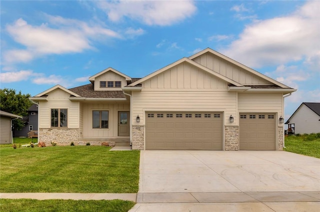 craftsman-style house with a front yard and a garage