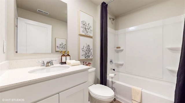 full bathroom featuring shower / bath combination with curtain, vanity, and toilet