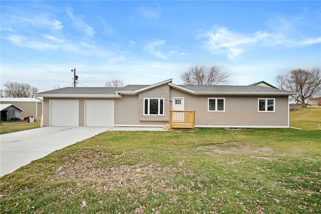 ranch-style home featuring a garage and a front yard