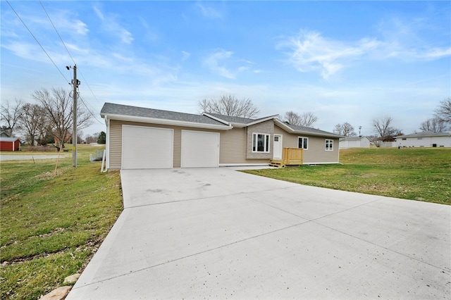 ranch-style home with a garage and a front yard