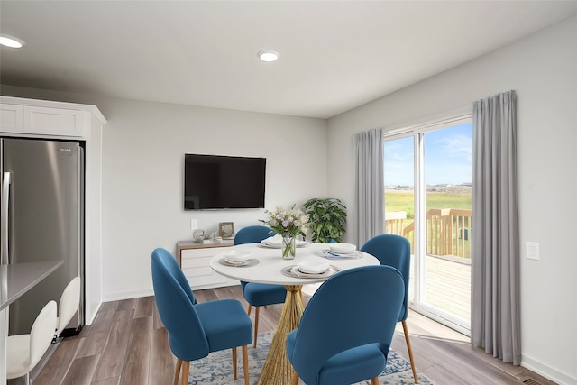 dining area featuring light hardwood / wood-style floors