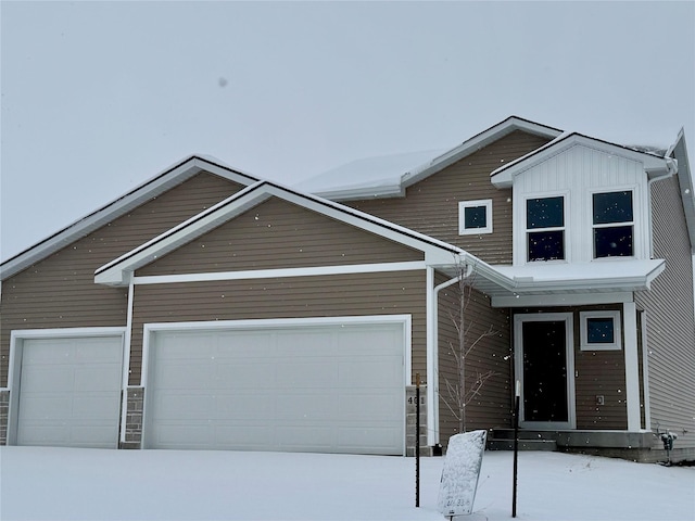 view of front of property featuring a garage