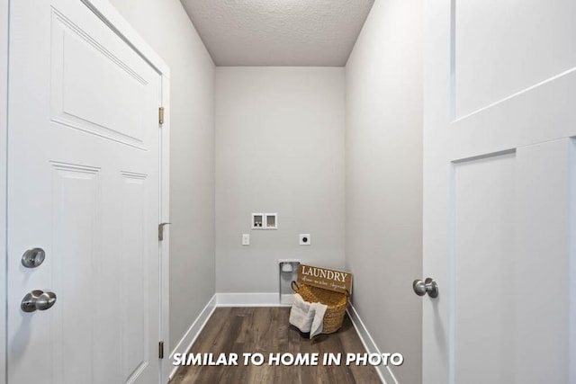 laundry room with electric dryer hookup, hookup for a washing machine, dark hardwood / wood-style floors, and a textured ceiling