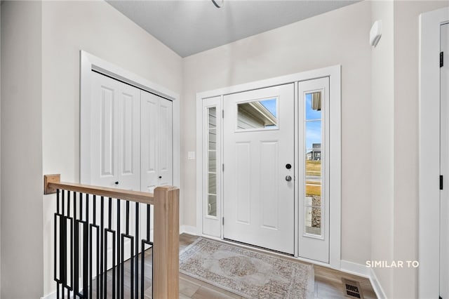 entrance foyer with light wood-type flooring