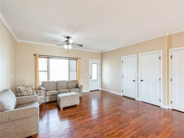 living room featuring wood-type flooring, ceiling fan, and crown molding