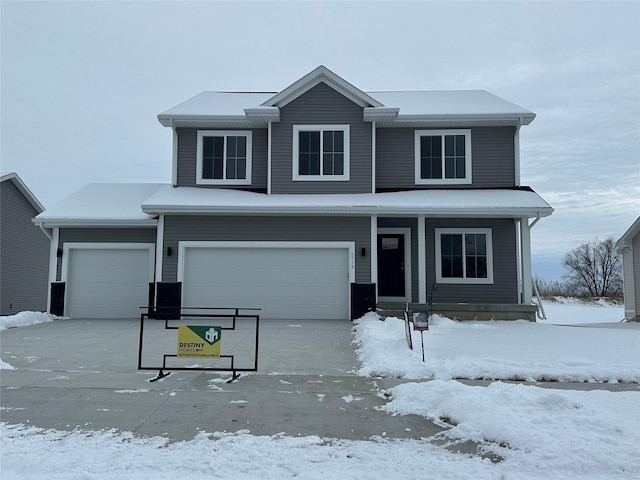 front of property featuring a garage