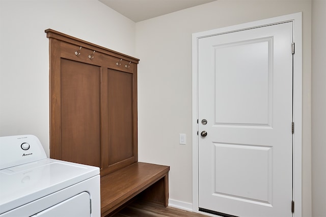 laundry room featuring dark hardwood / wood-style flooring and washer / clothes dryer