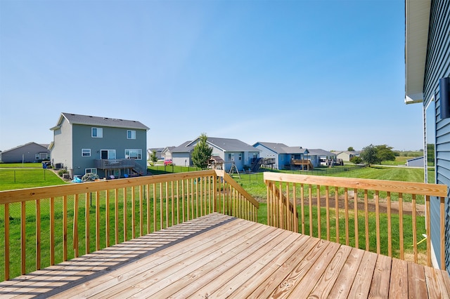 deck featuring a lawn