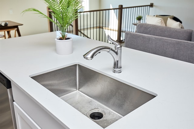 details featuring dishwasher and sink