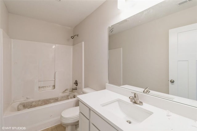 full bathroom featuring vanity, toilet, and bathtub / shower combination