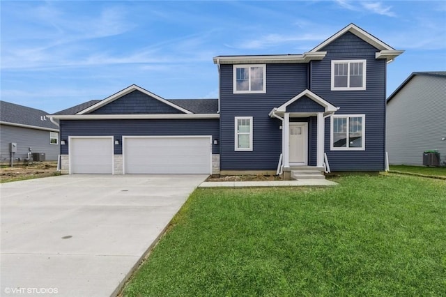 view of front of property featuring central AC unit, a garage, and a front yard