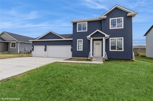 view of front of house featuring a garage and a front yard