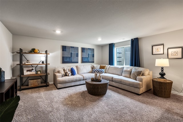 carpeted living room with recessed lighting and baseboards