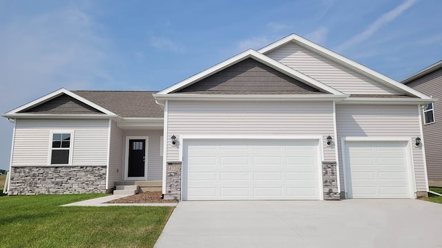 view of front facade with a garage, stone siding, concrete driveway, and a front lawn