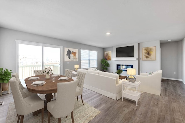 dining area with light wood-type flooring