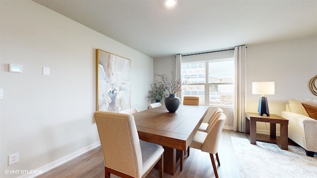 4416 NE 13th St, Ankeny, IA 50021 - dining area featuring light wood finished floors and baseboards